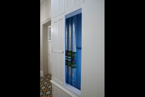 A new cupboard outside each apartment houses the vertical service runs – these run under the floor into each apartment
